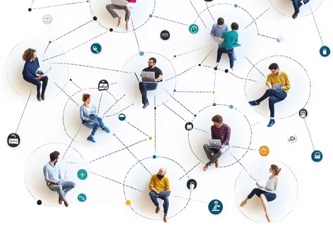 An illustration representing an overhead view of individuals sitting across a network map of connected node lines